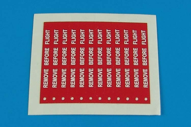 320002  Remove before flight flags - white lettering